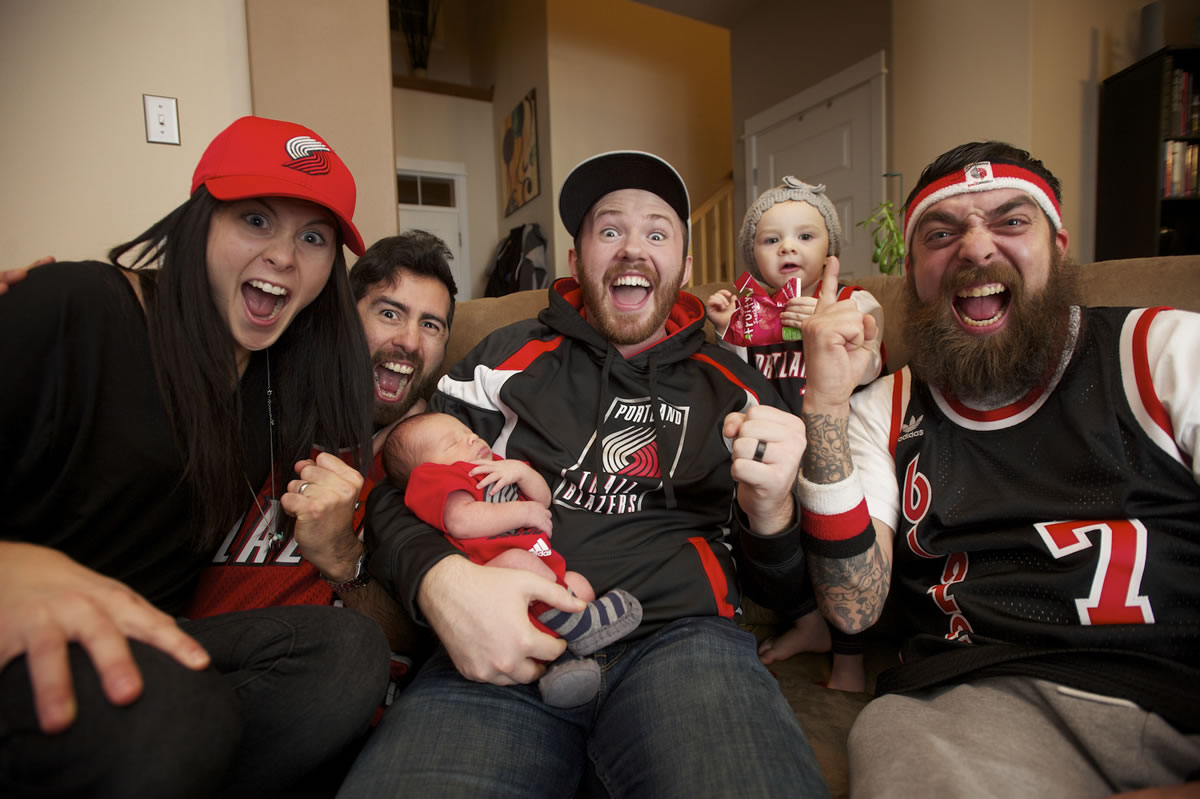 Trail Blazers fans, from left, Emily Perez, Robert Perez, Mytas Carlson, Ricky Carlson, Ella Mae Carlson and Joe McLaughlin, like to get together to watch games and cheer on their team.