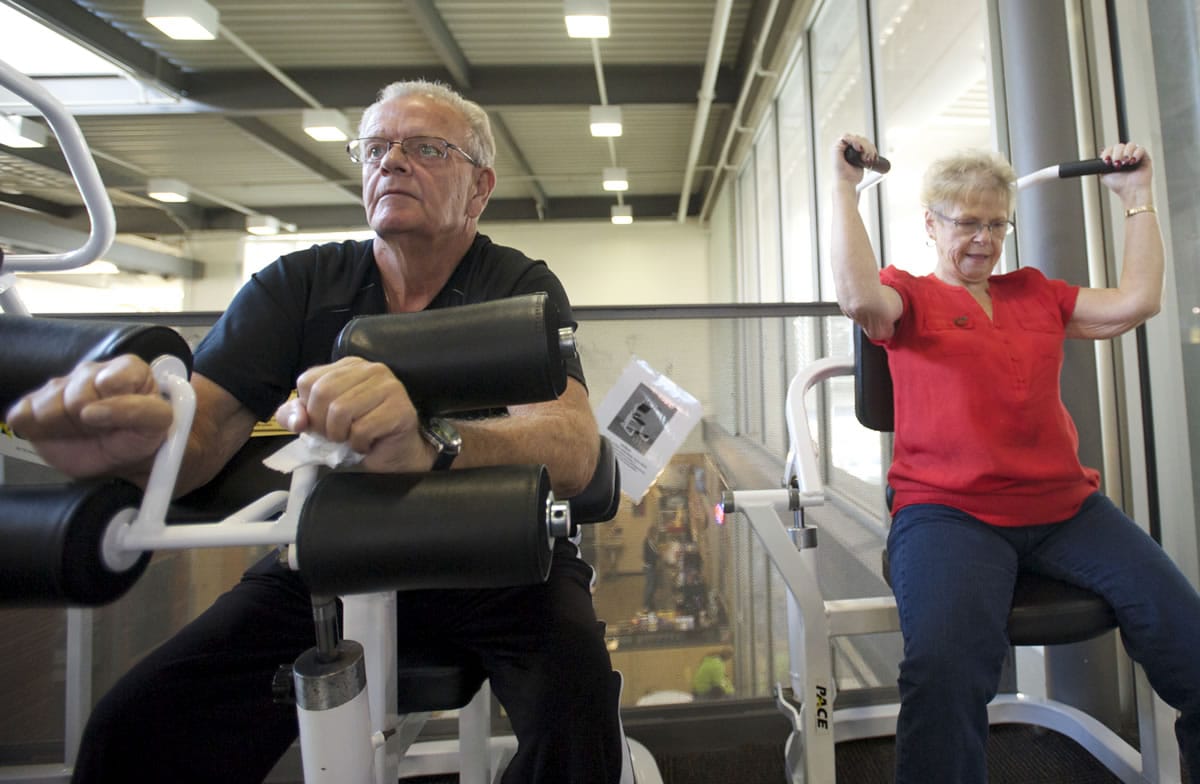 Cecil and Charlane Cardwell, both of whom have had gastric bypass surgery, exercise at the Firstenburg Community Center in Vancouver Wednesday.
