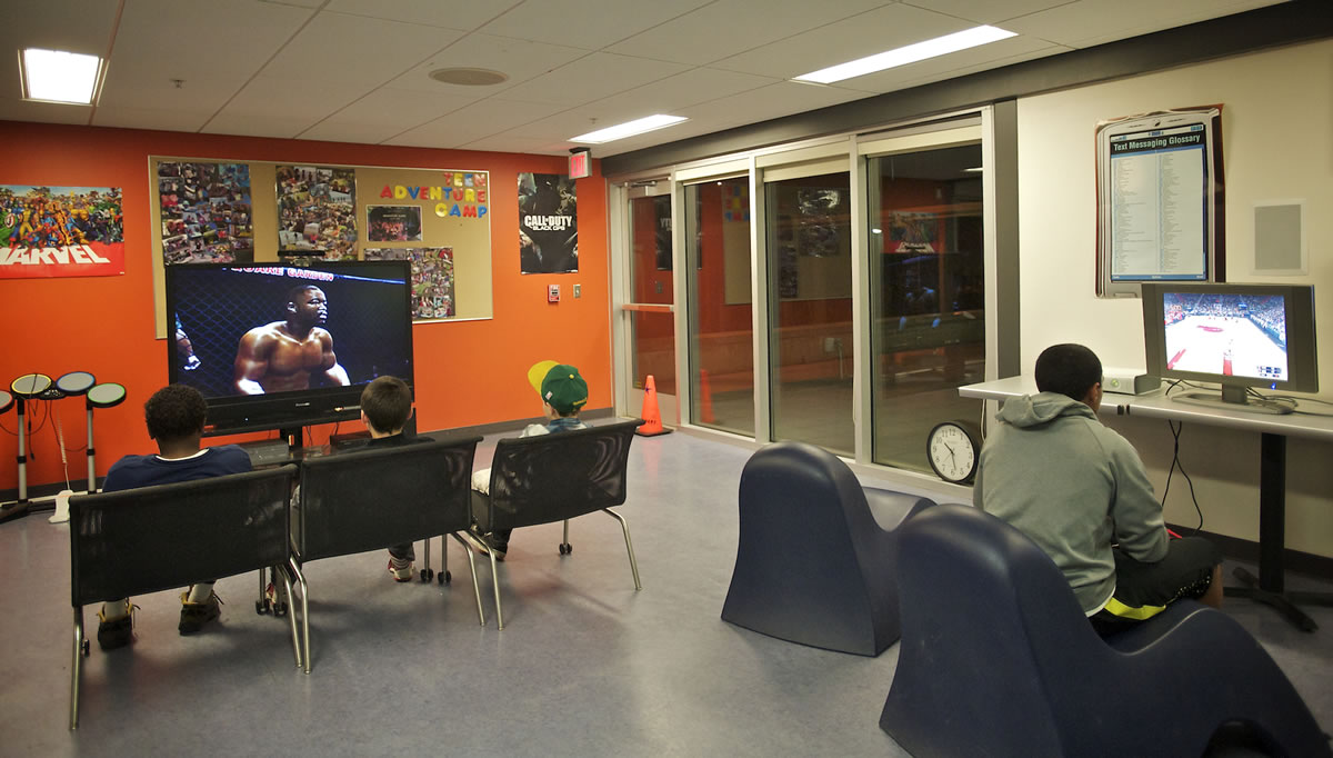 Teens enjoy a late night at the Marshall Community Center in November 2012.