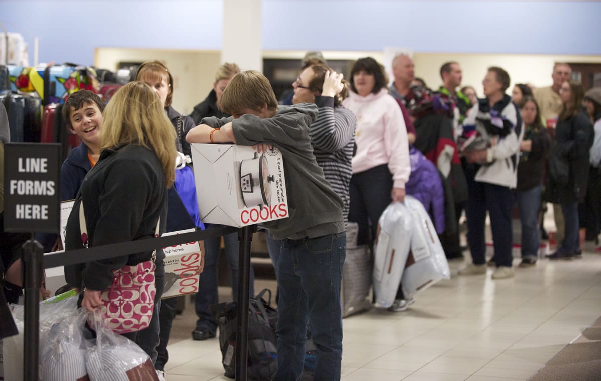 Black Friday shoppers take advantage of sale prices at J.C. Penney at Westfield Vancouver mall in 2012. J.C. Penney will open at 8 p.m.