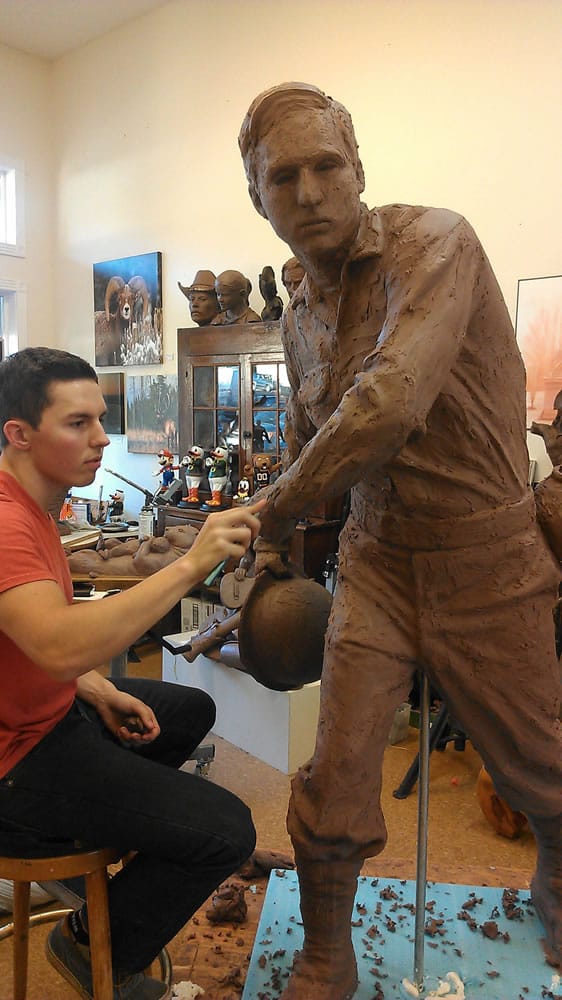 Hockinson: 20-year-old Chad Caswell from Hockinson works on a sculpture of World War II soldier Leonard DeWitt, from McMinnville, Ore.