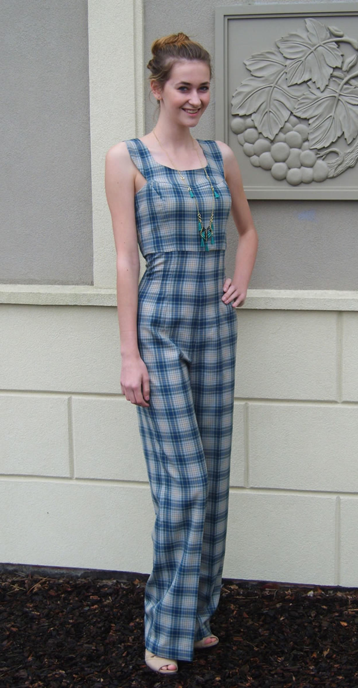 Miranda Dowler, 16, of Vancouver models the wool plaid jumpsuit she entered in the Washington State Make It With Wool Contest.
