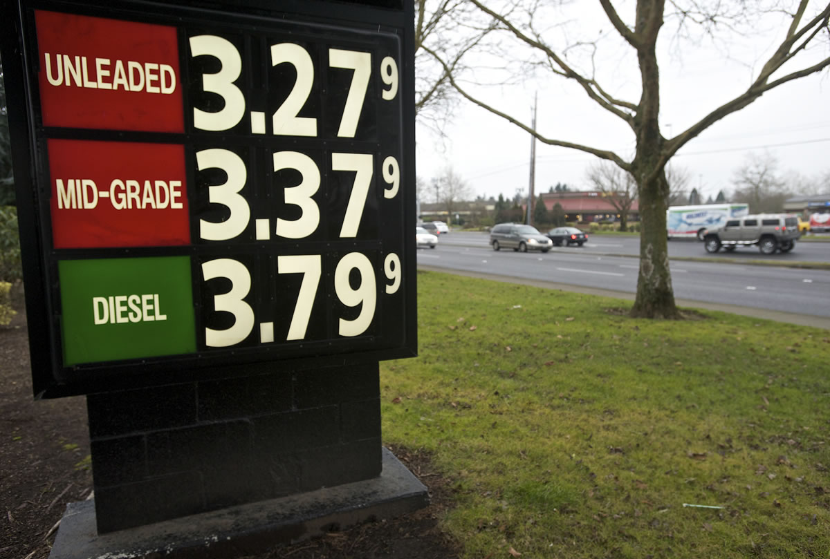 Fuel prices are listed on a sign at the Fred Meyers on Southeast 164th Avenue on Monday.