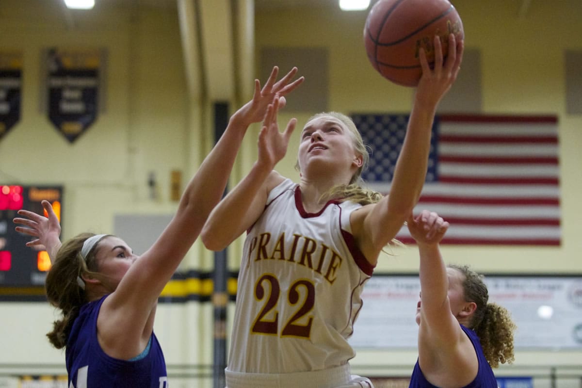 Prairie's Nicole Goecke drives to the basket against Columbia River for two of her 13 points Friday.