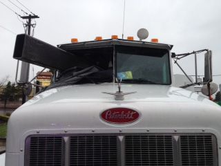 A steel beam went through the windshield of a tractor-trailer Wednesday in Tualatin, Ore.