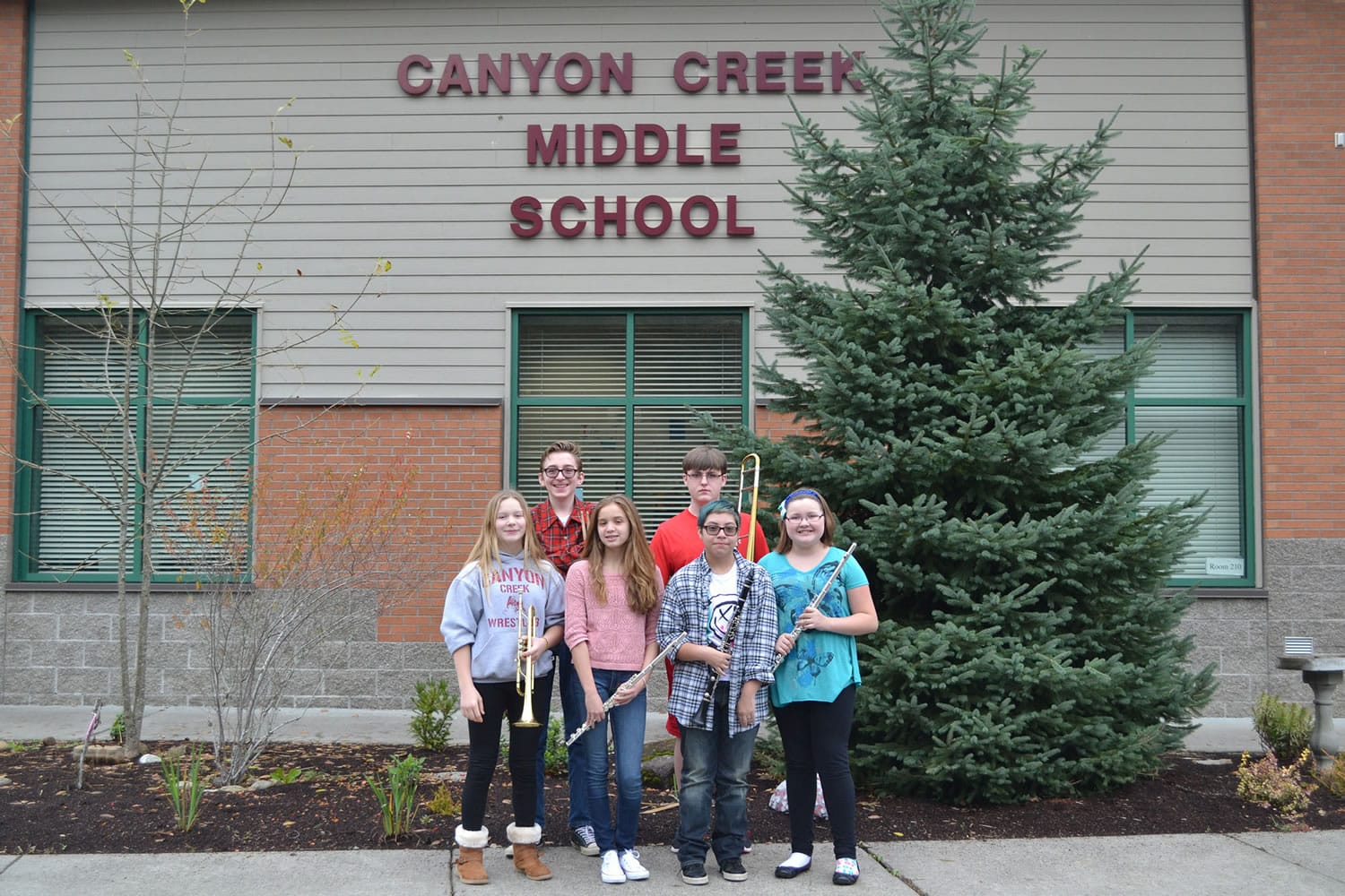 Washougal: Canyon Creek musicians Maddie Wakefield, front from left, Maliyah Veale, Jennie Mariscal, and Kelly Langston; back from left, William Weihl and Kyle Hendrickson were named to the North County Middle School Honor Band.