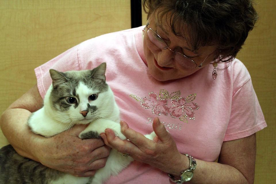 Walnut Grove: Furry Friends volunteer Jan Berg with Jack Frost at the shelter&#039;s Give More!
