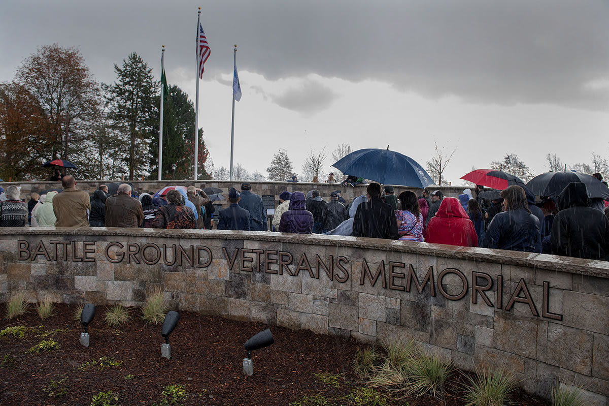 Hundreds of area residents join local veterans at the dedication for the new Battle Ground Veterans Memorial on Wednesday afternoon at Kiwanis Park.
