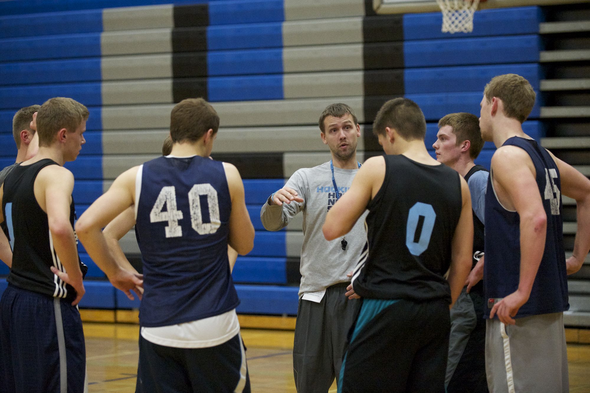 Hockinson boys basketball coach Trevor Person works with his seniors on Tuesday.