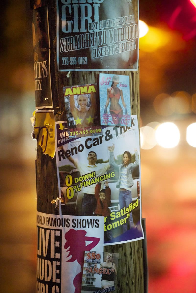 A telephone pole outside Paul's restaurant is emblazoned with fake Reno advertisements as part of the outdoor set design for the film &quot;Wild,&quot; which is based on a Portland author's memoir about hiking through the Pacific Crest Trail.