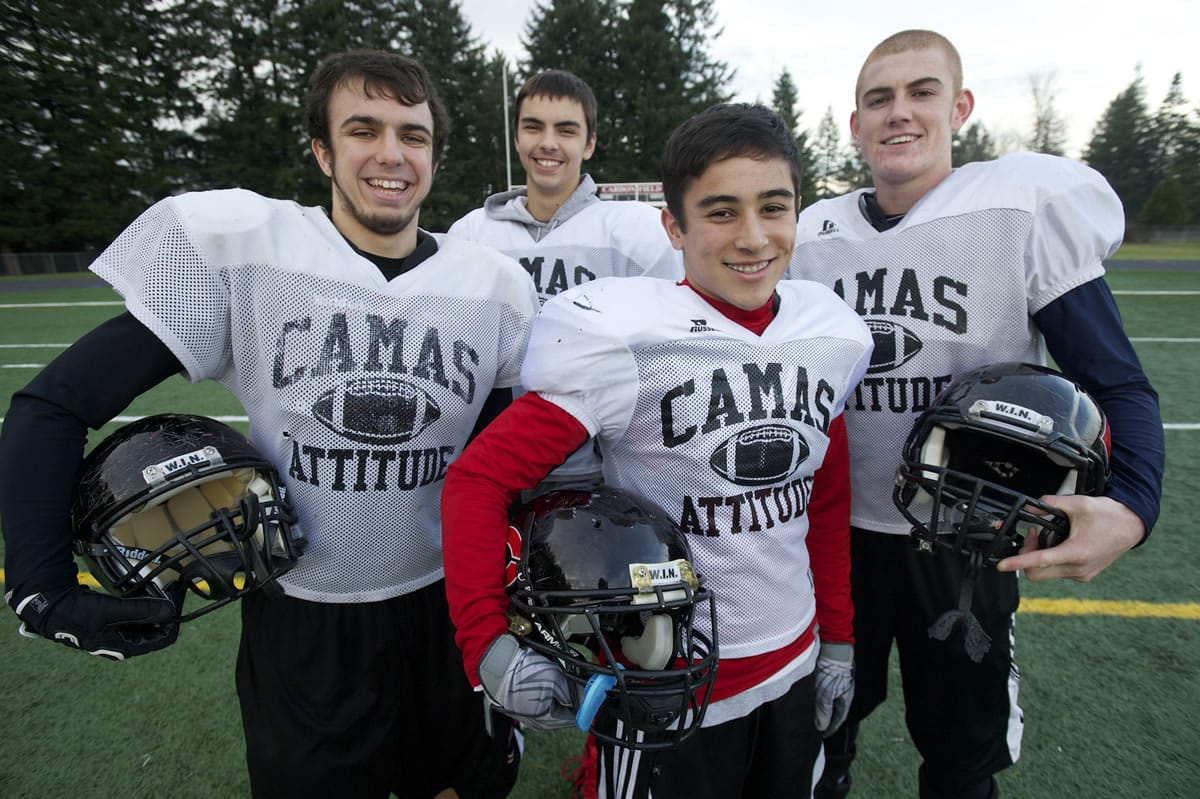 Members of the Camas football scout team, from left, Aaron Deml, Dustin Krecklow, Jordan Del Moral and Blake Roy,