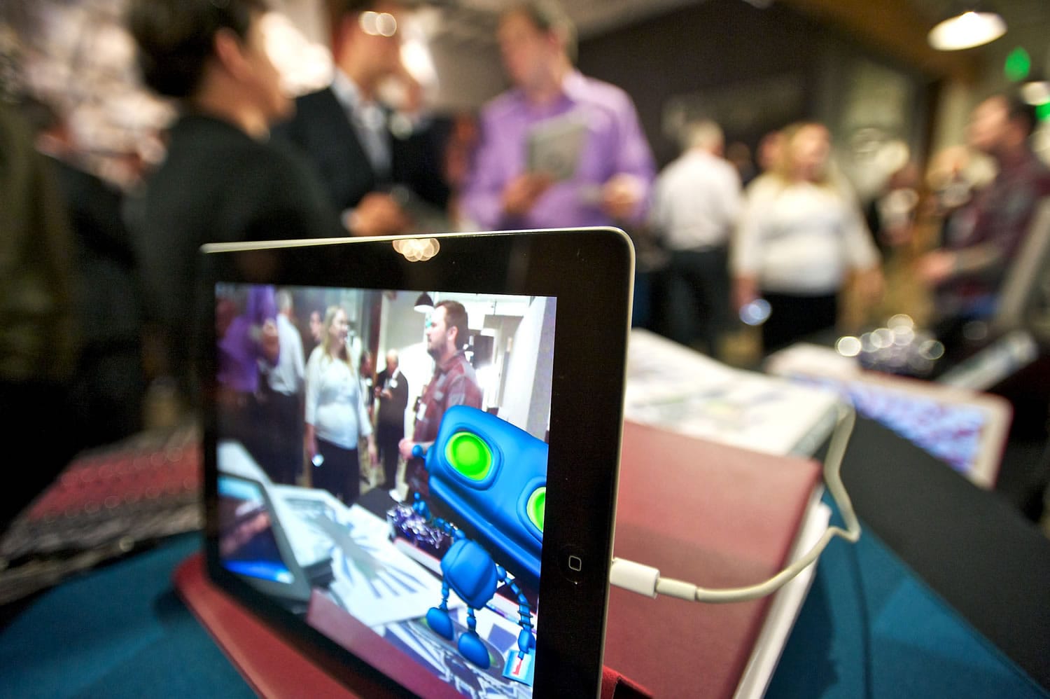During Thursday evening's &quot;Digital Innovation Showcase,&quot; an iPad displayed an &quot;augmented reality&quot; where a tablet or smartphone reads a 2D image and creates a 3D environment.