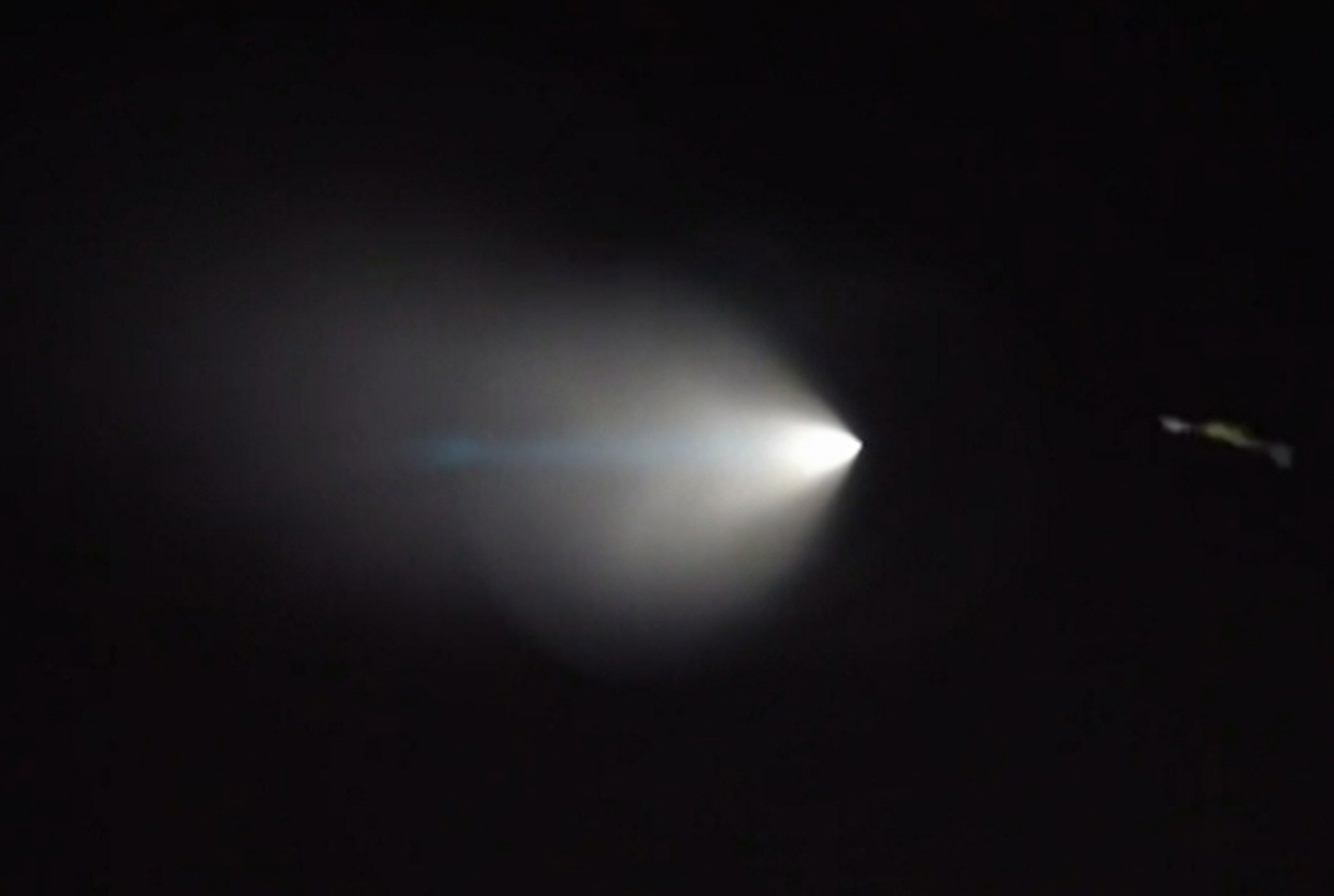 This Saturday image from video provided by Julien Solomita, shows an unarmed missile fired by the U.S. Navy from a submarine off the coast of Southern California, creating a bright light that streaked across the state and was visible as far away as Nevada and Arizona.