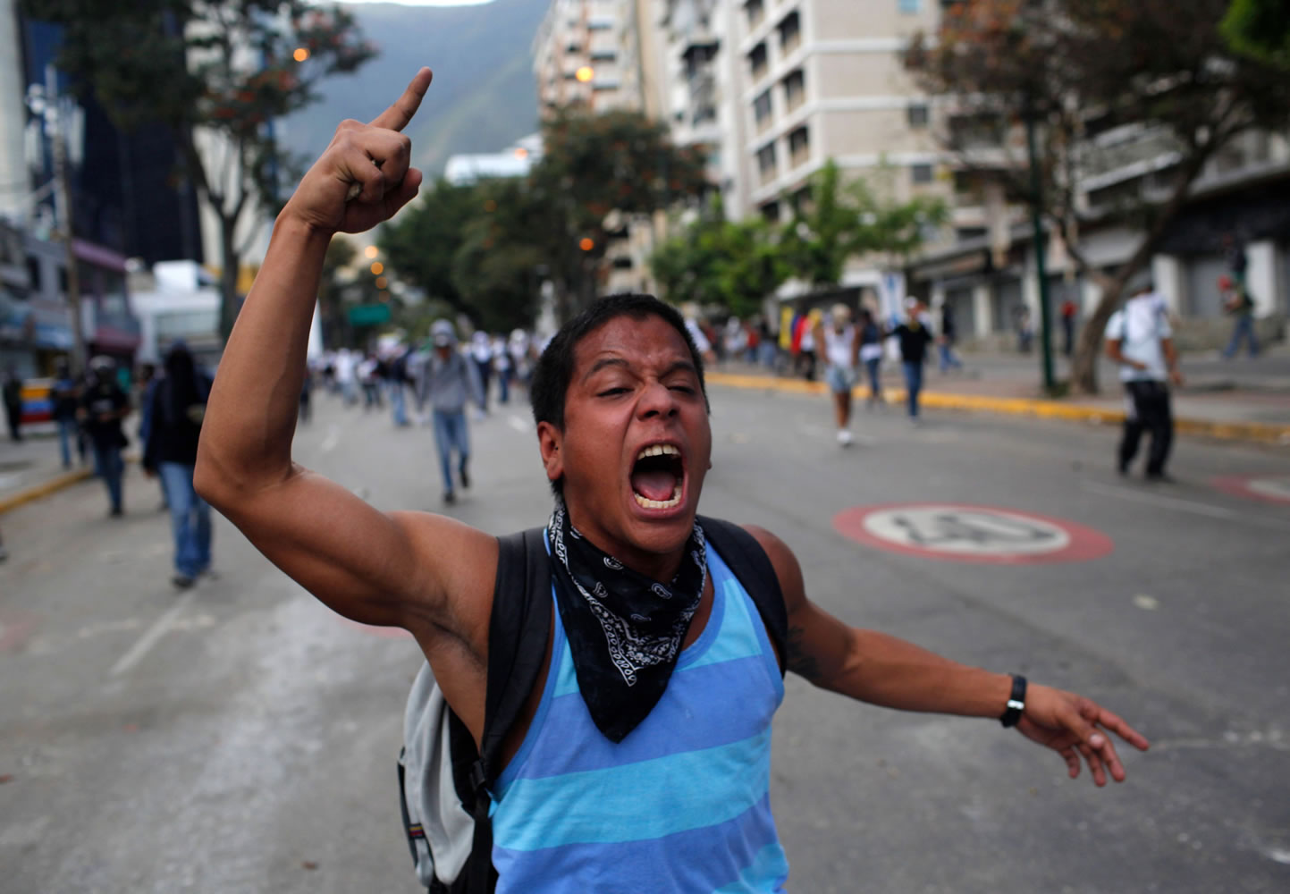 A demonstrator shouts slogans against Bolivarian National Guards on Sunday in Caracas, Venezuela.
