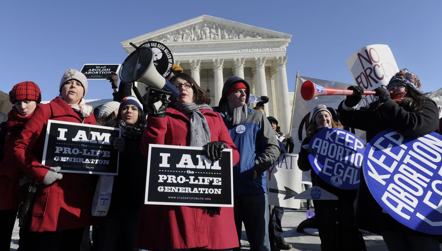 Pro-abortion and anti-abortion protestors rally outside the Supreme Court in Washington on Jan. 22 during the March for Life.