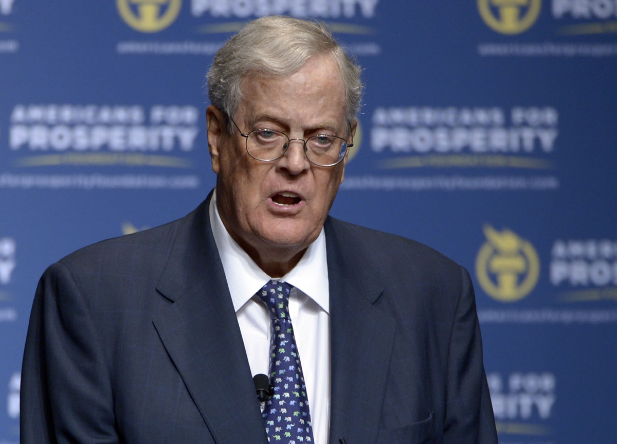 Americans for Prosperity Foundation Chairman David Koch speaks in August 2013 in Orlando, Fla. Democratic Senate candidates are gambling they can turn voters against two obscure billionaire brothers who are funding attacks on them and the president's health care law. Democrats are denouncing Charles and David Koch, two of the world's richest people. The pair's political network is spending millions on TV ads hitting Democrats in North Carolina and several other states.