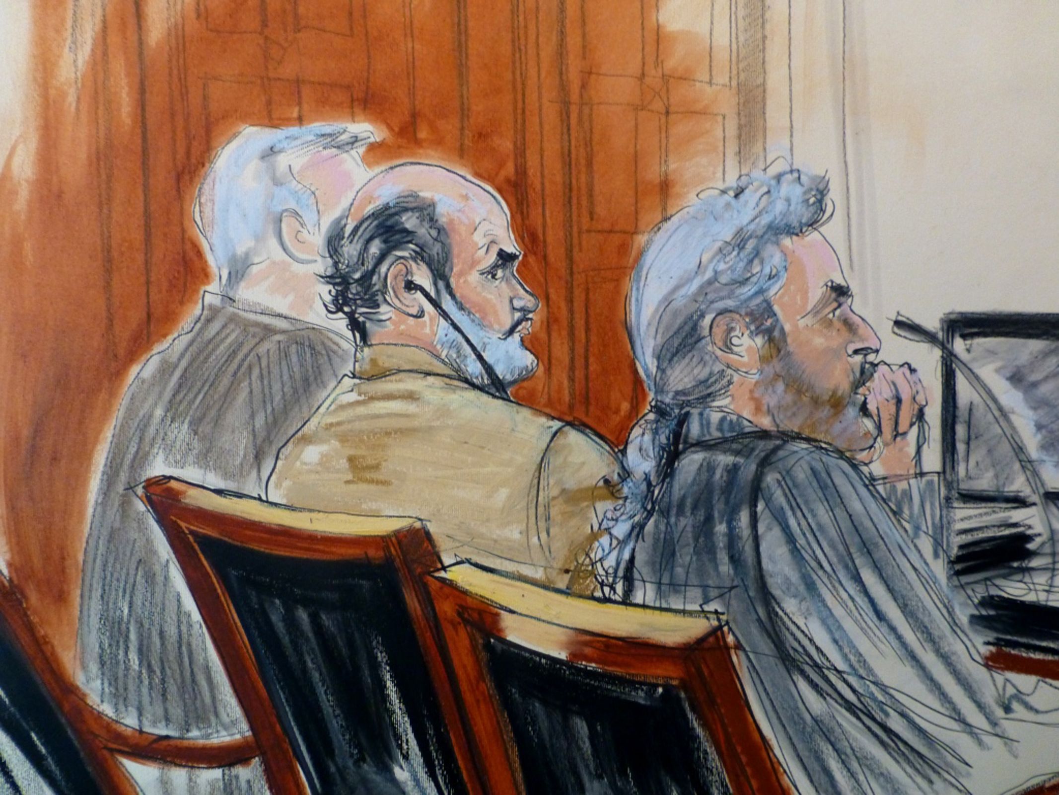 In this courtroom sketch, Sulaiman Abu Ghaith, center, is flanked by his legal team Monday during jury selection at the start of his trial in New York on charges that he conspired to kill Americans and support terrorists in his role as al-Qaida's spokesman after the Sept.