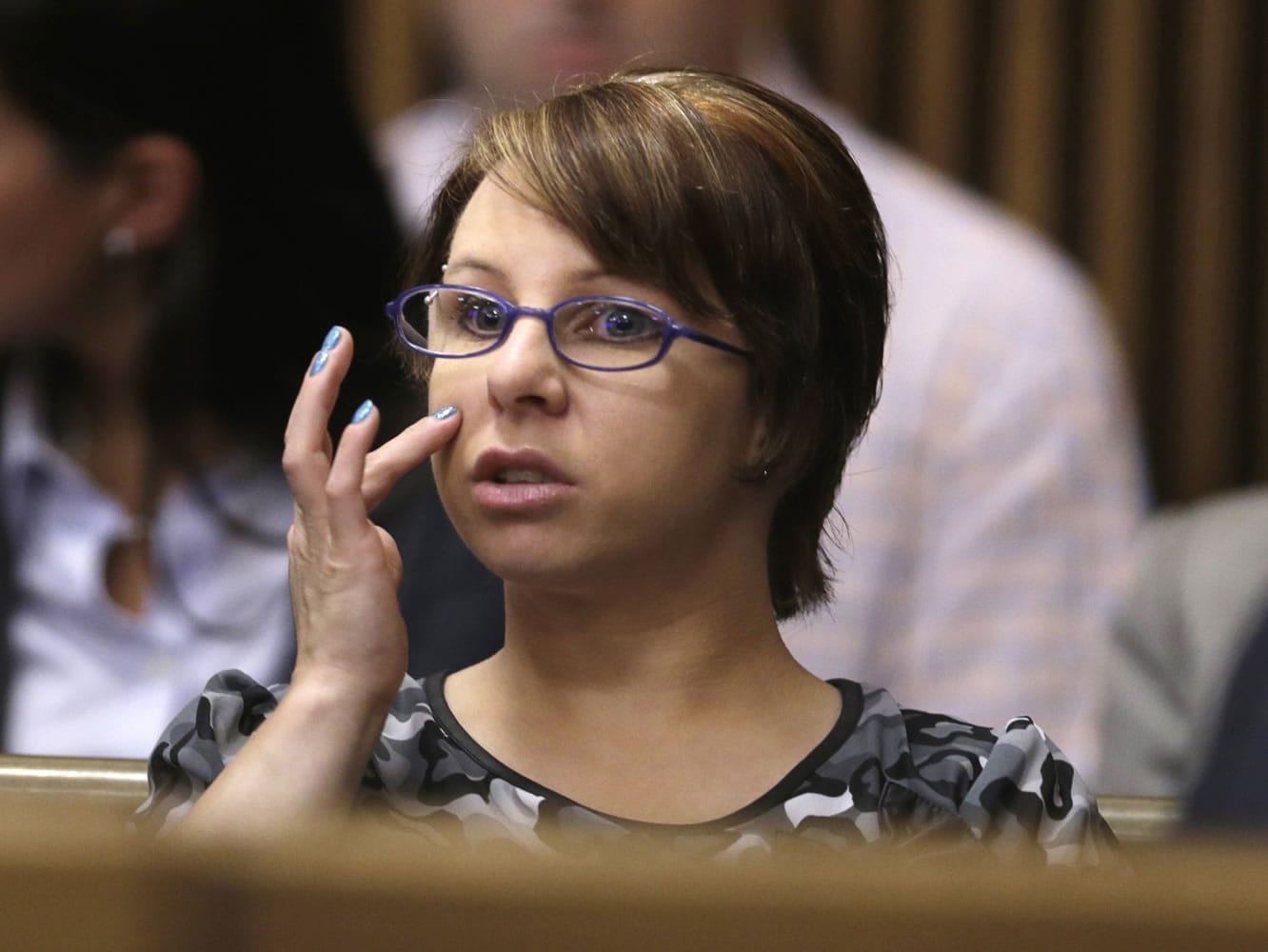 Michelle Knight sits in the courtroom during a break in the sentencing phase for Ariel Castro in Cleveland.