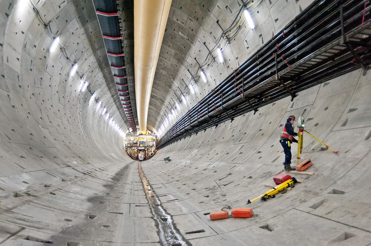 A surveyor sets up his gear near the south end of the Highway 99 tunnel in Seattle in December.
