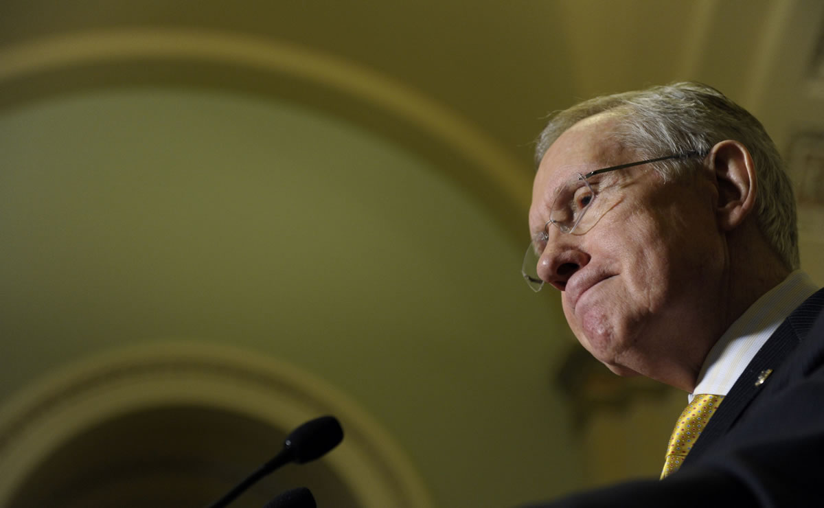 Senate Majority Leader Harry Reid of Nevada pauses during a news conference on Capitol Hill in Washington on Tuesday following a Democratic policy lunch.
