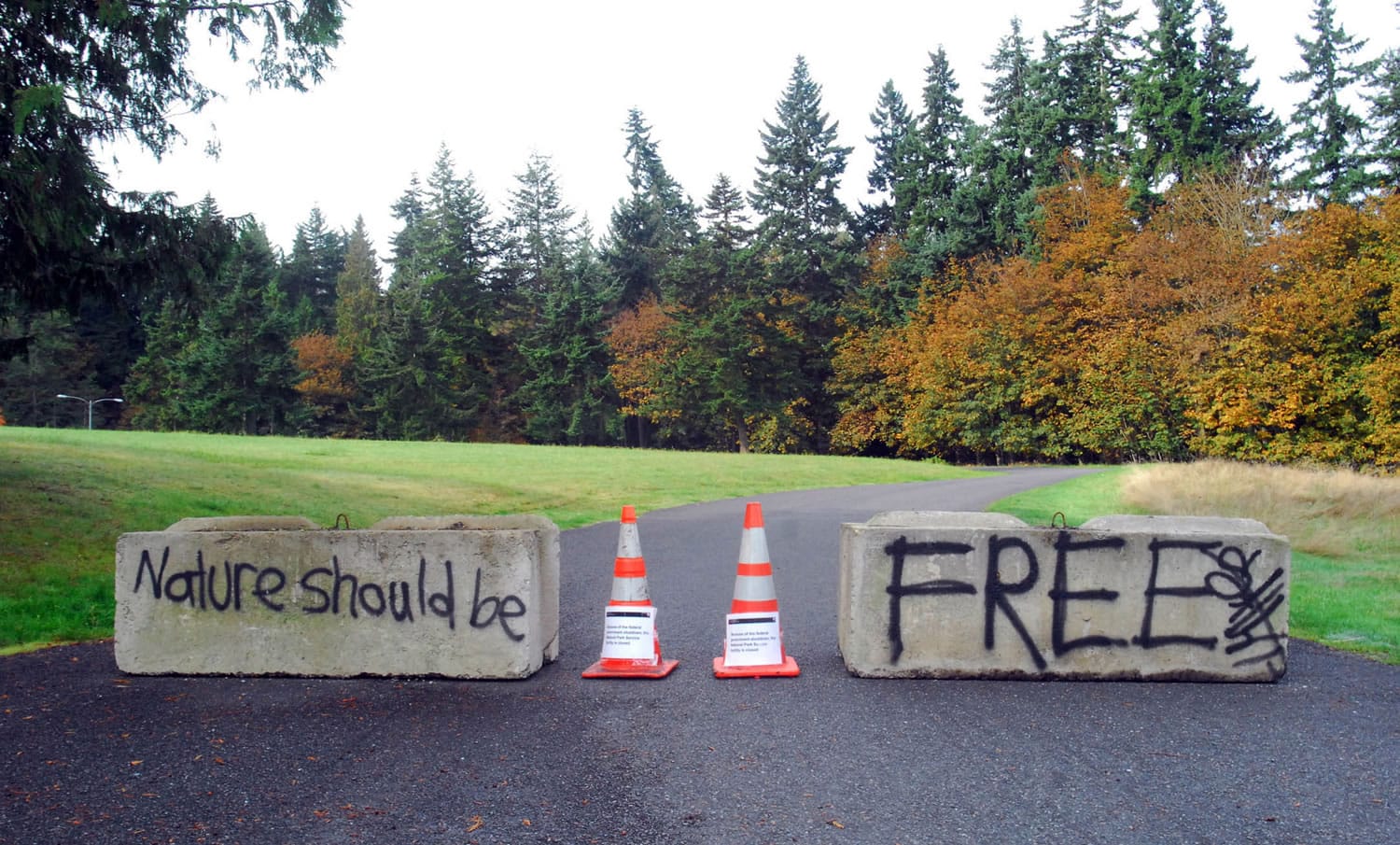 A pair of concrete barricades block the entrance to the visitors center for Olympic National Park in October during the partial government shutdown in Port Angeles