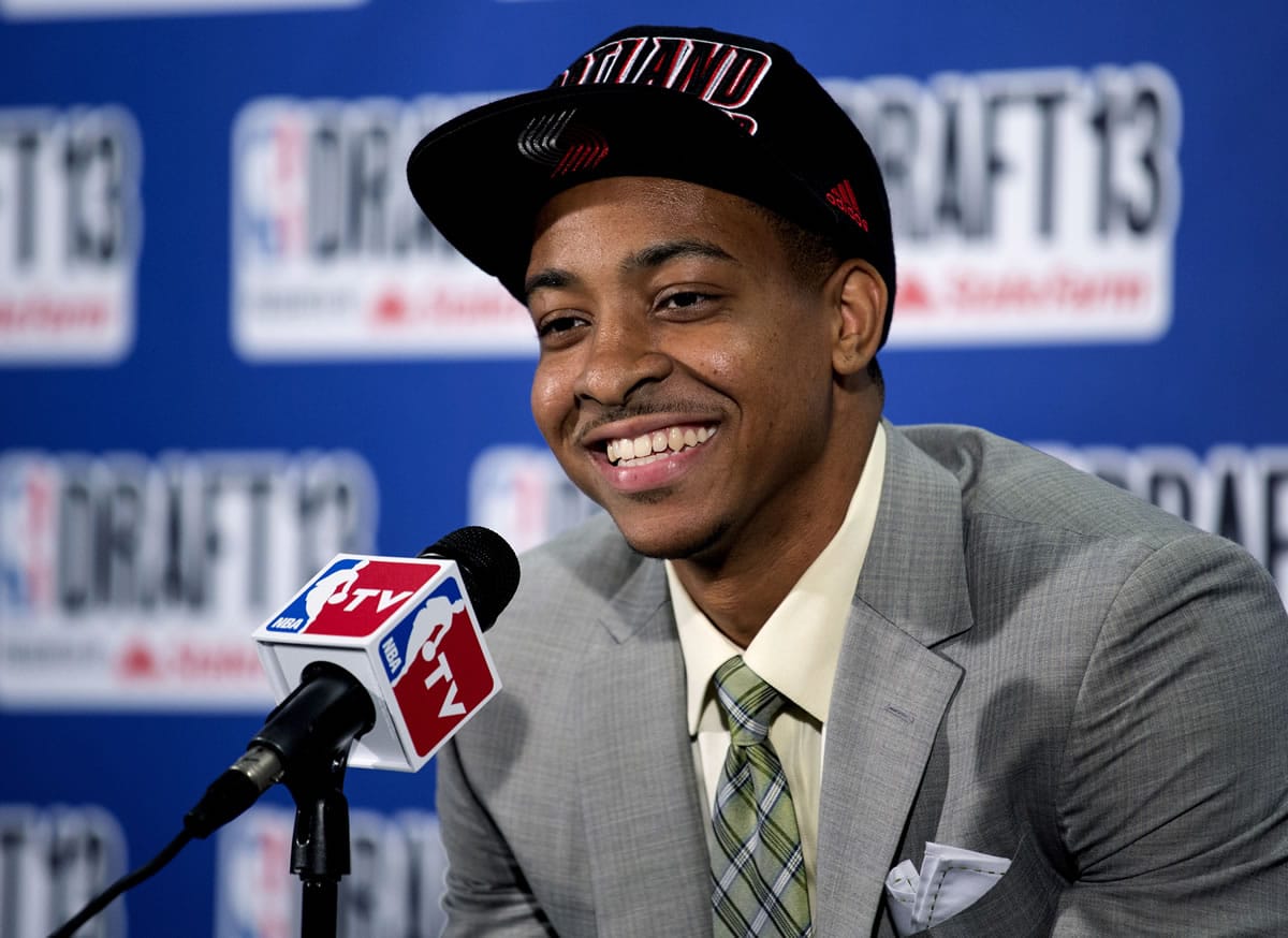 Lehigh's C.J. McCollum, picked by the Portland Trail Blazers in the first round of the NBA basketball draft, smiles during a news conference Thursday, June 27, 2013, in New York.