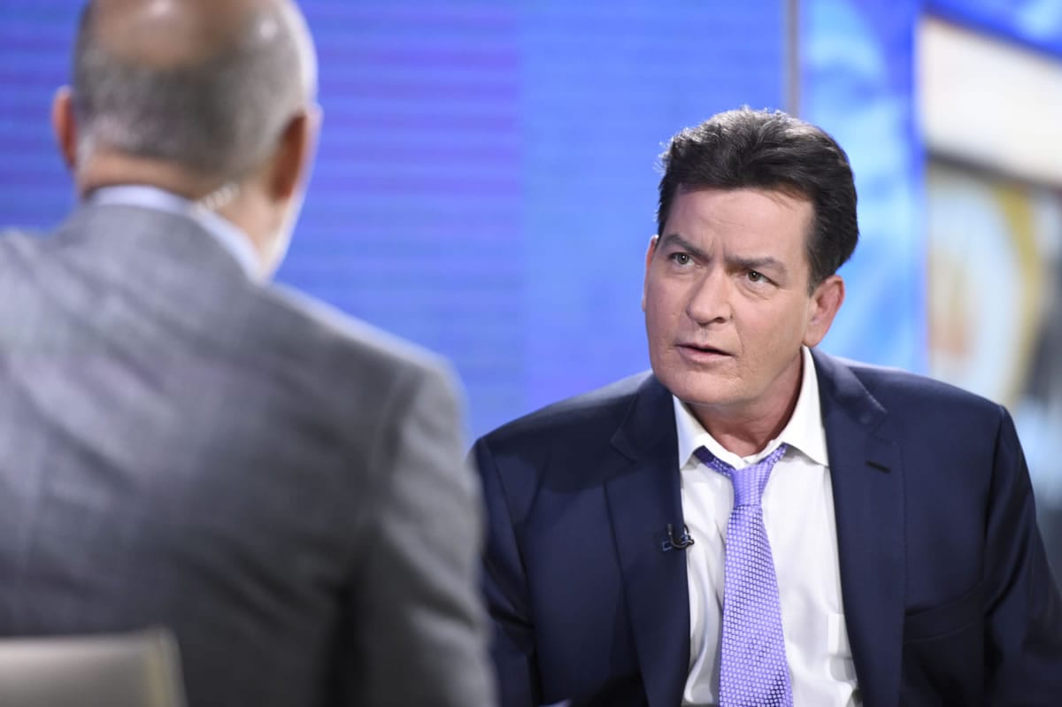 Former &quot;Two and a Half Men&quot; star Charlie Sheen, right, is interviewed by Matt Lauer on Tuesday on NBC&#039;s &quot;Today&quot; in New York. In the interview, the 50-year-old Sheen said he tested positive four years ago for the virus that causes AIDS.