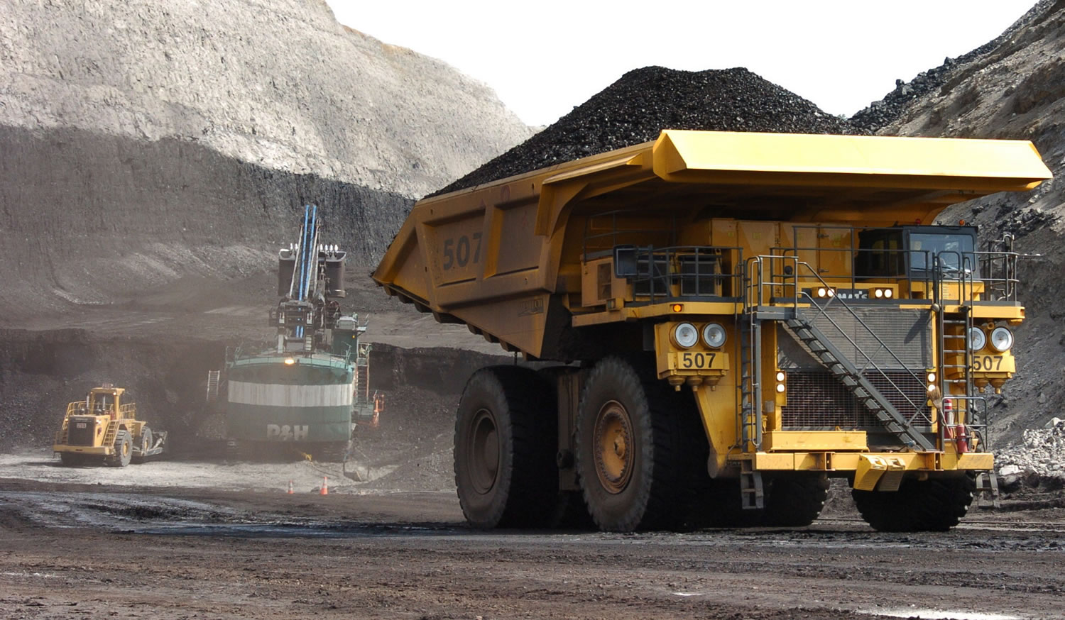 A truck carrying 250 tons of coal hauls it to the surface of the Spring Creek mine near Decker, Mont.