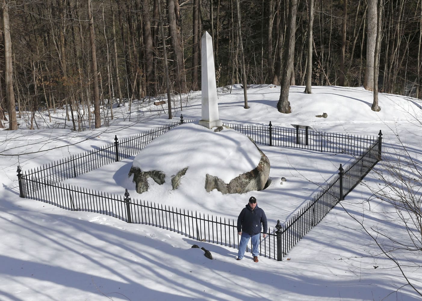 Randy Patten stands in front of the Ephraim Williams Jr. memorial on Wednesday in Lake George, N.Y.
