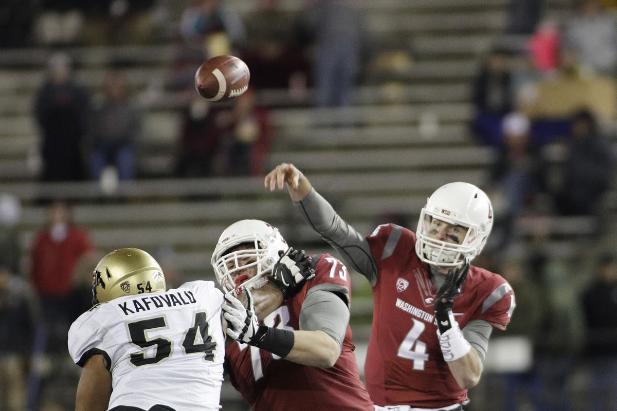Washington State quarterback Luke Falk (4) throws a pass during the second half of an NCAA college football game against Colorado, Saturday, Nov. 21, 2015, in Pullman, Wash. Washington State won 27-3.