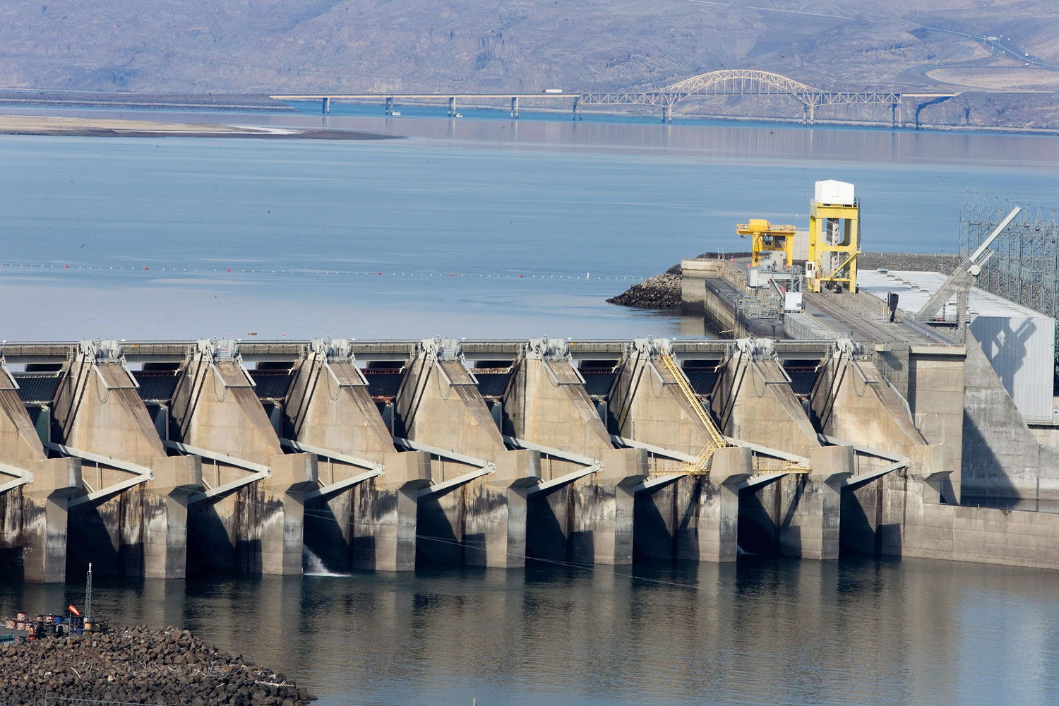 The Wanapum Dam spillway support, fourth support from the right, is seen Monday near Vantage. The spillway has a large crack beneath the water surface.