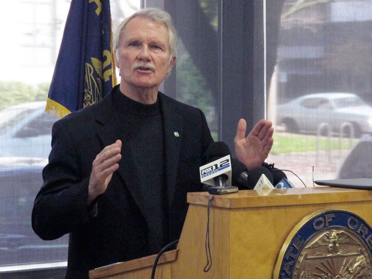 Oregon Gov. John Kitzhaber discusses problems with the website for Cover Oregon, the state's health insurance exchange, during a news conference in Portland on Nov. 1. More than a month after Cover Oregon was supposed to launch, reality is lagging far behind Gov. Kitzhaberis ideals.
