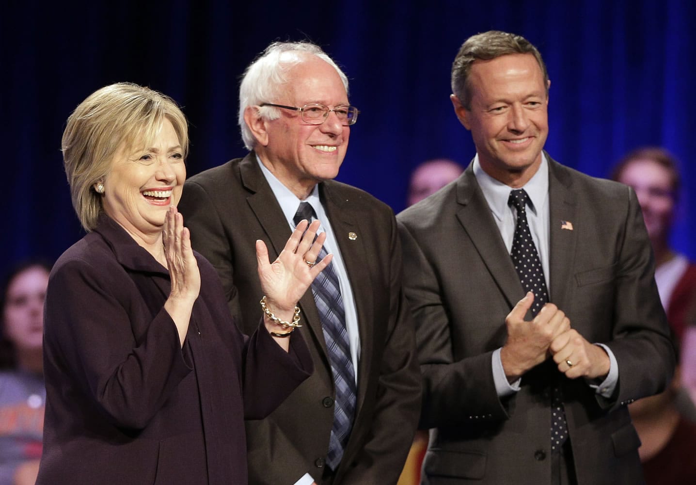 Democratic presidential candidates Hillary Rodham Clinton, from left, Sen. Bernie Sanders, I-Vt., and former Maryland Gov. Martin O'Malley, smile after a Democratic presidential candidate forum Nov. 6 at Winthrop University in Rock Hill, S.C. Clinton has locked up public support from half of the Democratic insiders who cast ballots at the party's national convention, giving her a commanding advantage over her rivals for the party's presidential nomination. Clinton's margin over Sanders and OMalley is striking.