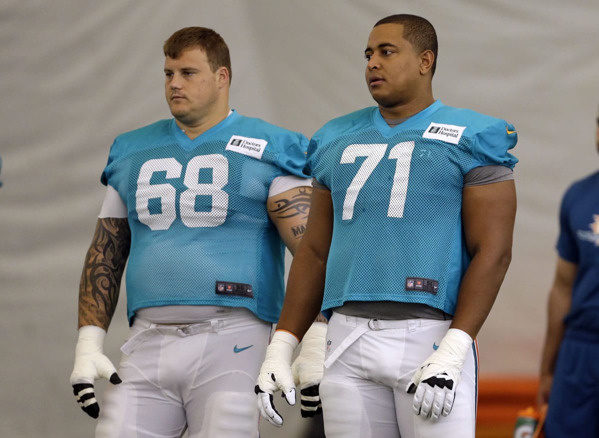 Miami Dolphins guard Richie Incognito, left, and tackle Jonathan Martin.