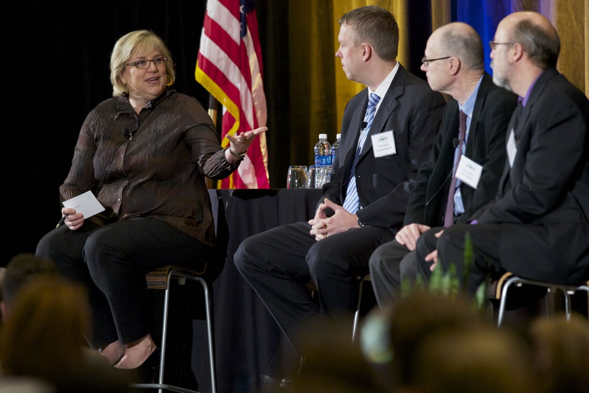 The Columbian's 2014 Economic Forecast Breakfast keynote panel included, from left, Betsy Henning, moderator; Rick Goode, CEO of Columbia Machine Inc.;  Jon Roberts, principal of TIP Strategies, based in Austin, Tex.; and Scott Bailey, regional economist for the state Employment Security Department.