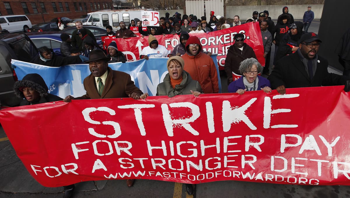 Protesters rally for better wages at a Wendy's in Detroit on Thursday.