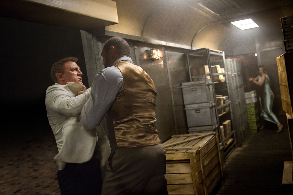 Daniel Craig, left, and Dave Bautista have a disagreement in the James Bond film &quot;Spectre.&quot; (Jonathan Olley/Metro-Goldwyn-Mayer Pictures)