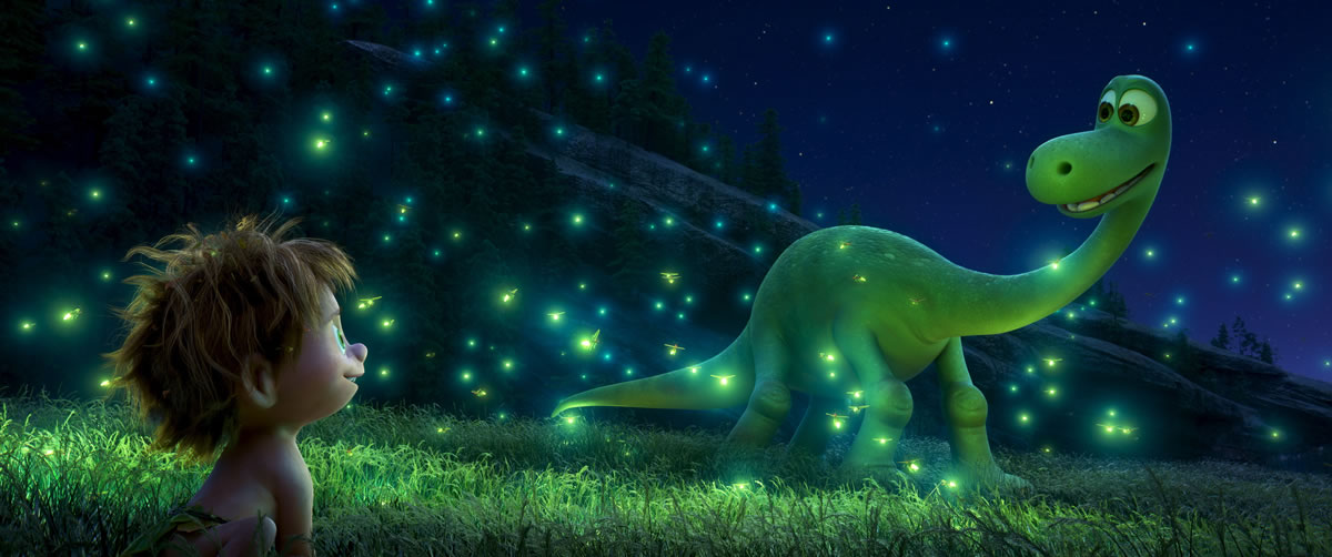 Spot, left, voiced by Jack Bright, and Arlo, voiced by Raymond Ochoa, become unlikely traveling companions in “The Good Dinosaur.” (Pixar-Disney)
