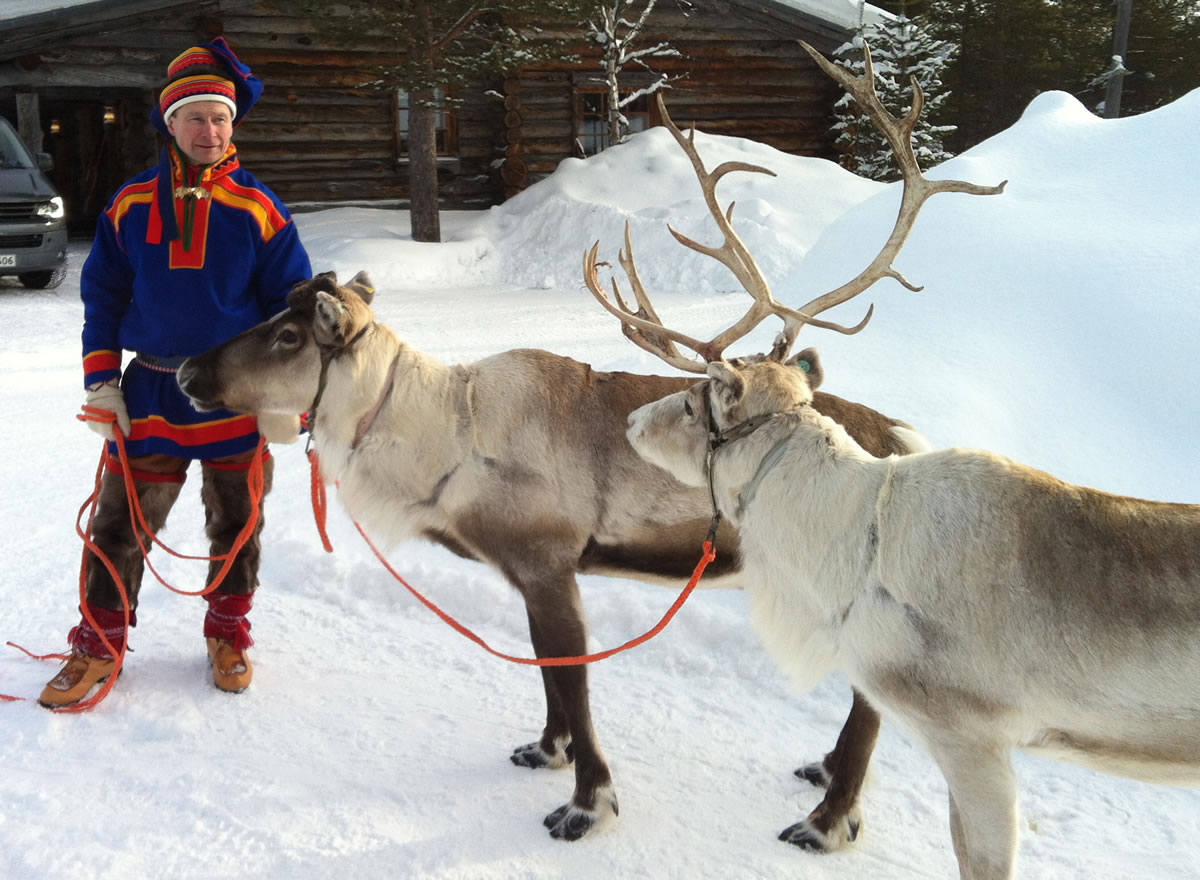 David McDougall/Associated Press
A Sami reindeer handler holds two of his herd in Saariselka, Finnish Lapland, in March. Reindeer are featured on Christmas cards and in movies worldwide this time of year, galloping across the sky with Santais sleigh in tow. But on Europe's northern fringe, the migratory mammals are part of everyday life all year round as they roam the fells of Lapland -- the Arctic homeland of the indigenous Sami people of Norway, Sweden, Finland and northwest Russia.