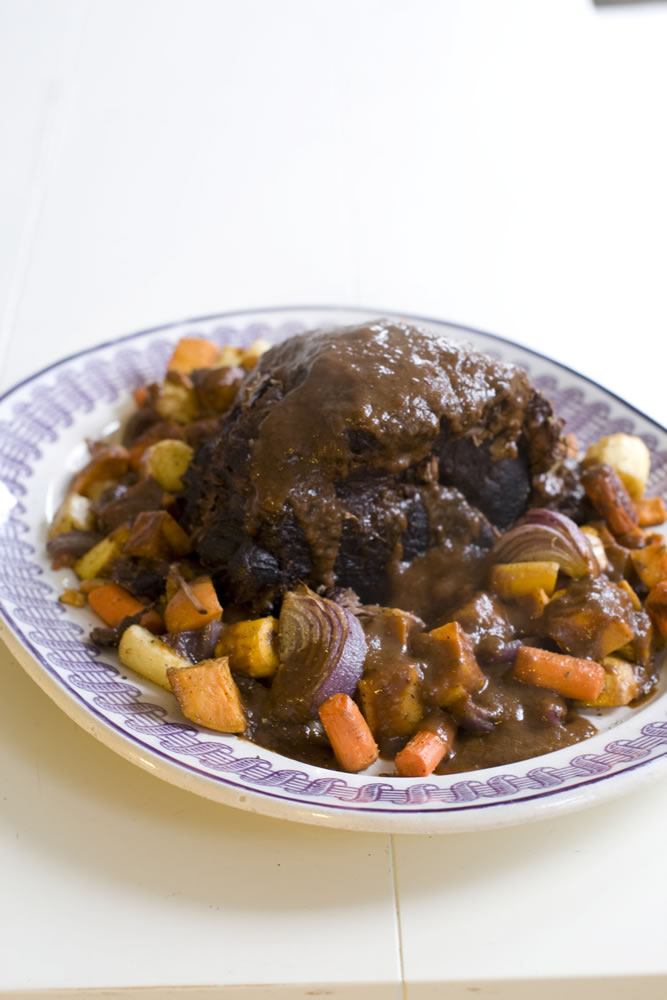 This Nov. 11, 2013 photo shows holiday pot roast with spiced root vegetables in Concord, N.H. This recipe is easy and designed to give maximum flavor with minimum labor.