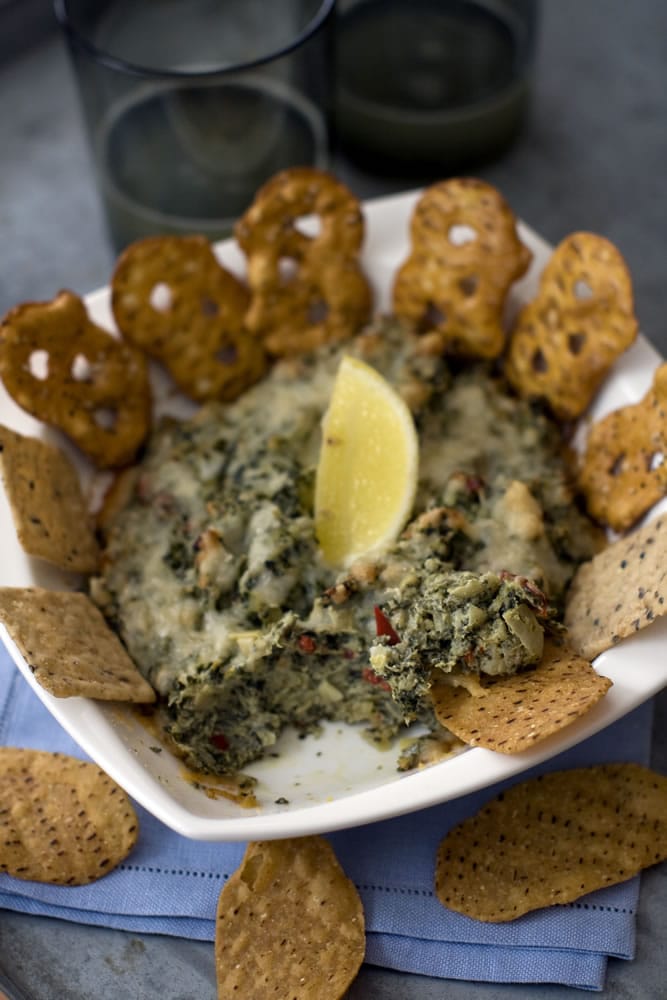 Canned artichokes give a lemony kick to this hot and spicy artichoke spinach dip.