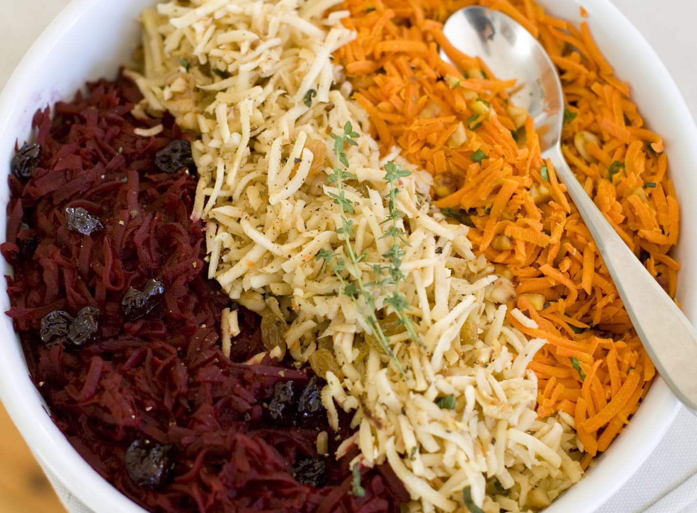 Shredded Beets With Balsamic, from left, Shredded Parsnips With Walnuts, and Shredded Spicy Carrots.