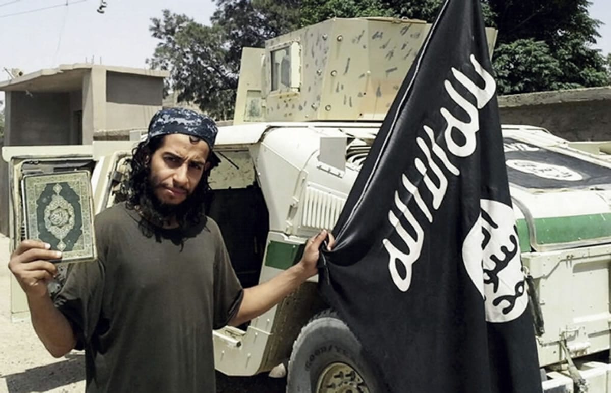 This undated image made available in the Islamic State's English-language magazine Dabiq, shows Belgian Abdelhamid Abaaoud. . Abaaoud the Belgian jihadi suspected of masterminding deadly attacks in Paris was killed in a police raid on a suburban apartment building, the city prosecutor's office announced Thursday Nov. 1, 2015. Paris Prosecutor Francois Molins' office said 27-year-old Abdelhamid Abaaoud was identified based on skin samples. His body was found in the apartment building targeted in the chaotic and bloody raid in the Paris suburb of Saint-Denis on Wednesday.