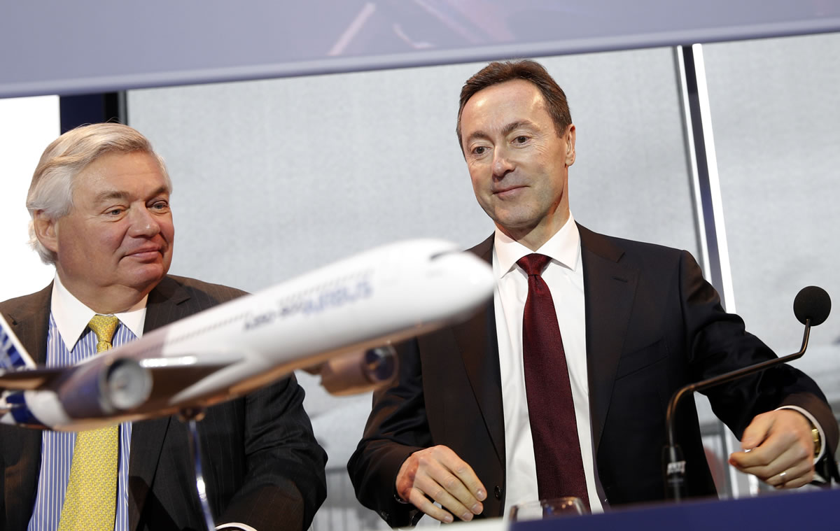 John Leahy, commercial director for Airbus, left, and Airbus CEO Fabrice Bregier arrive for an annual news conference in Toulouse, France, on Monday.