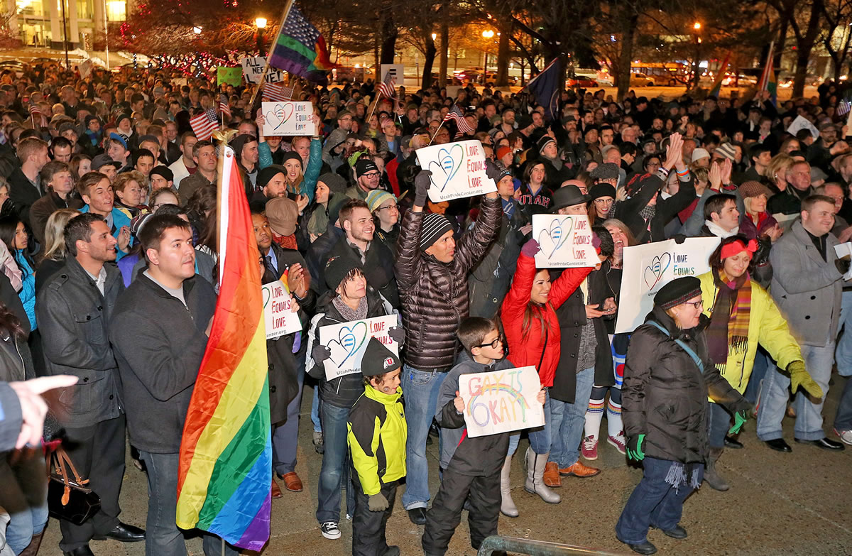 About 1,500 people gather to celebrate marriage equality after a federal judge declined to stay his ruling that legalized same-sex marriage in Utah at Washington Square just outside of the Salt Lake City and County Building on Monday in Salt Lake City.