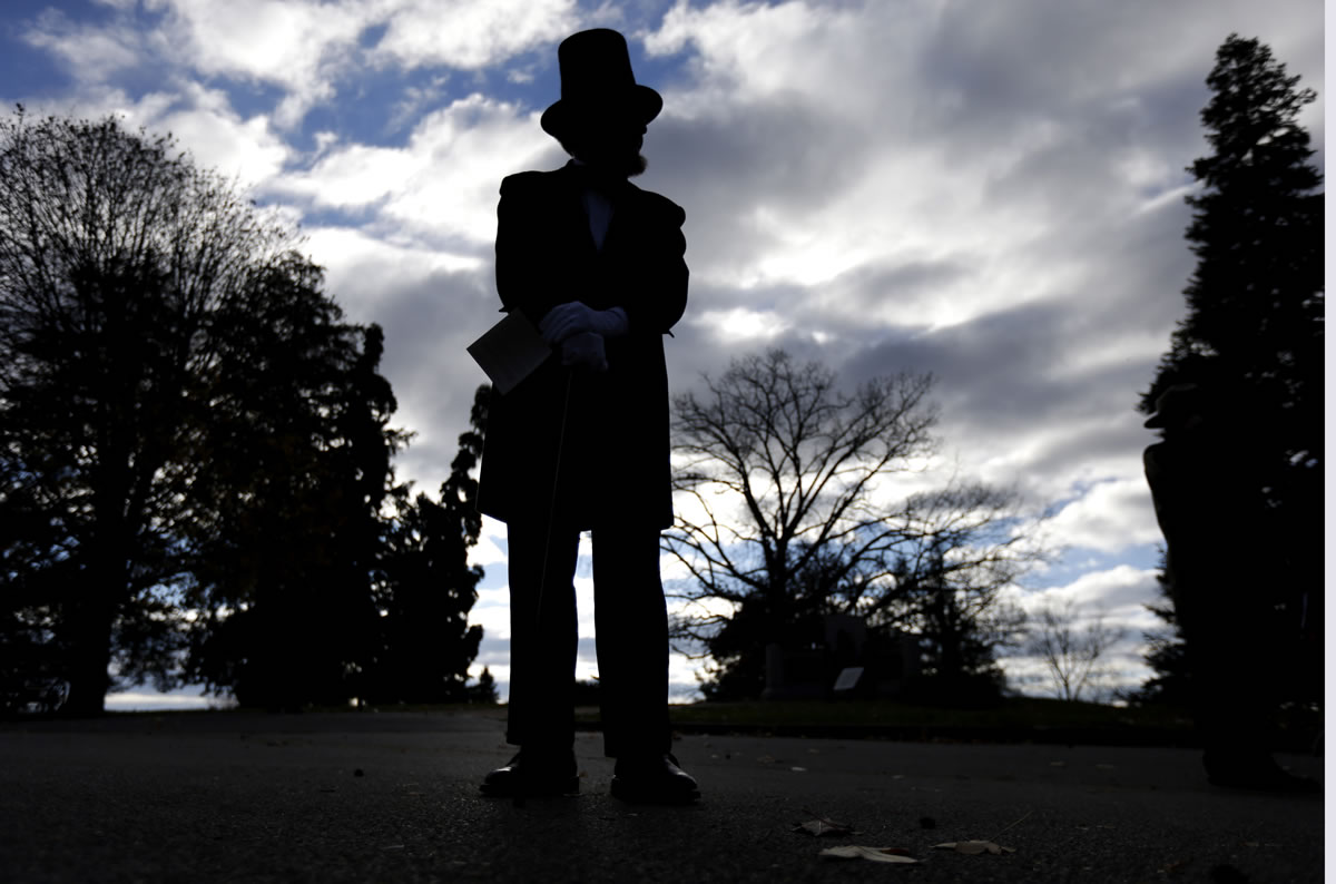 James Getty, portraying President Abraham Lincoln, stands before a ceremony commemorating the 150th anniversary of the dedication of the Soldiers' National Cemetery and President Abraham Lincoln's Gettysburg Address on Tuesday in Gettysburg, Pa.