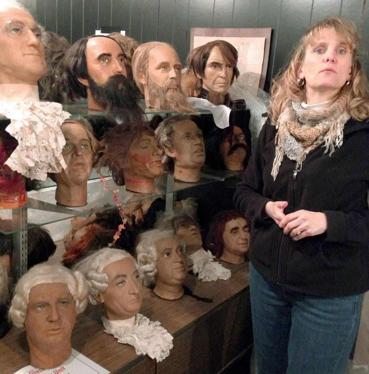 Tammy Myers, who runs the American Civil War Wax Museum for FutureStake Inc., stands Thursday beside shelves of heads of characters from the museum in Gettysburg, Pa.