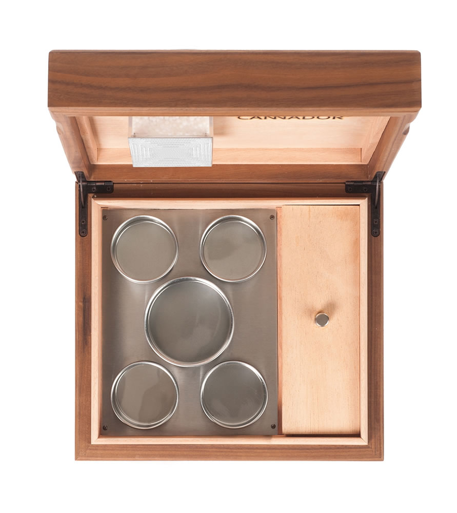 Cannador offers this humidor with a walnut exterior and a mahogany interior. It is large enough to hold five strains.