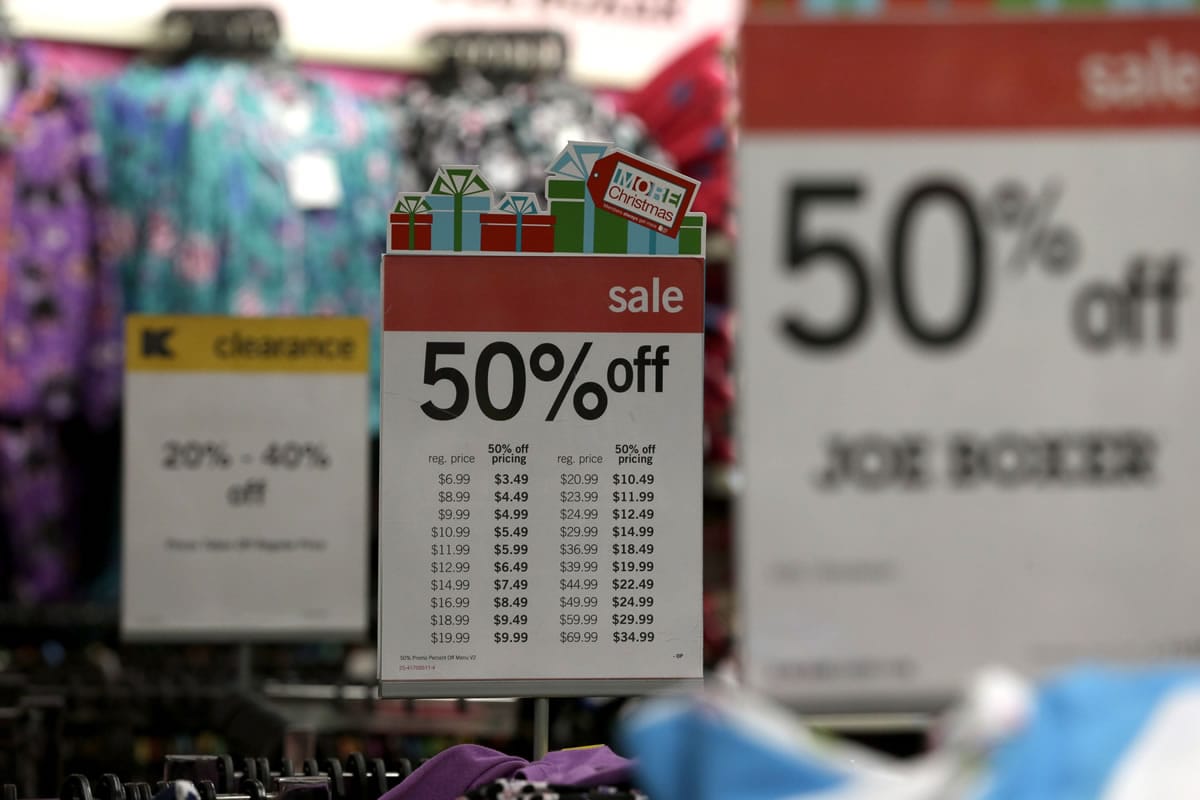 Sale signs are displayed at a Kmart in New York.
