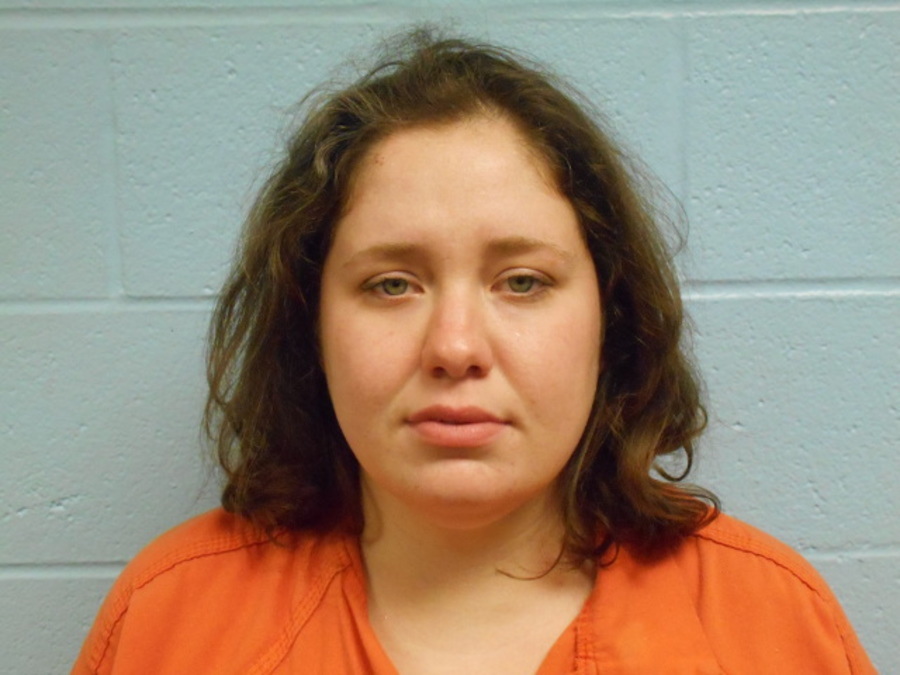 Adacia Chambers is accused of running a red light and purposely driving around a barricade and over a police motorcycle before crashing into spectators at Oklahoma State University&#039;s homecoming parade. Payne County District Attorney Laura Thomas formally charged Chambers with four counts of second-degree murder and 46 counts of felony assault on Wednesday.